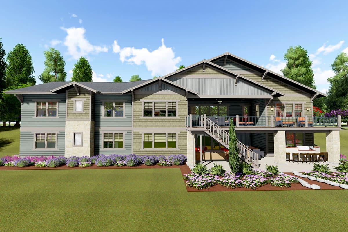 House plan exterior: Two-story home with stacked stone accent, multiple gables, and a large deck with stairs.