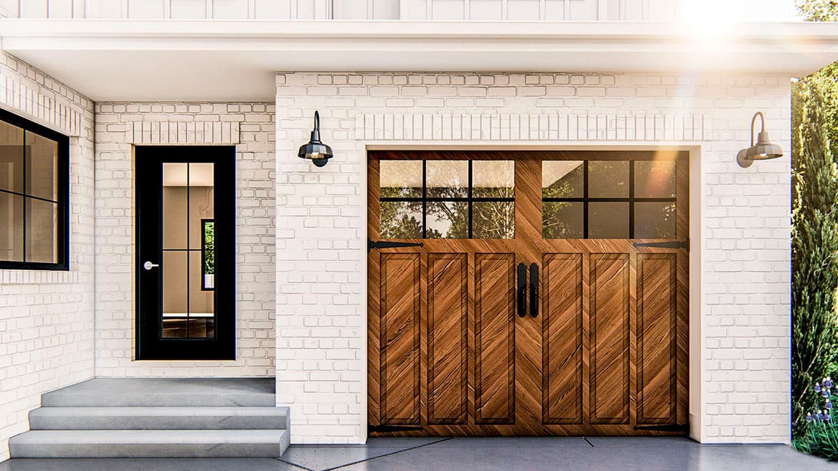 Exterior house plan showing a wood paneled garage door with windows, a glass paneled entry door, and white brick siding.