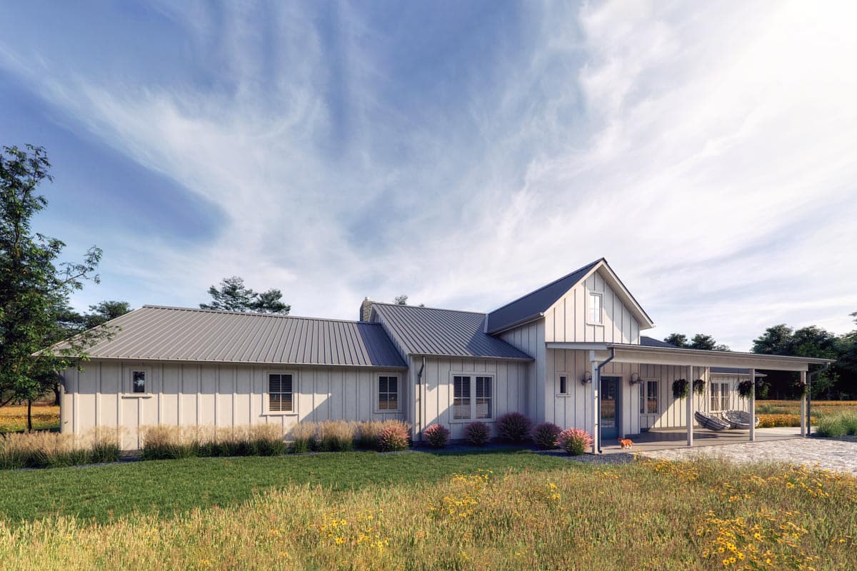 Modern Farmhouse house plan exterior with metal roof, board and batten siding, and covered porch with swings.