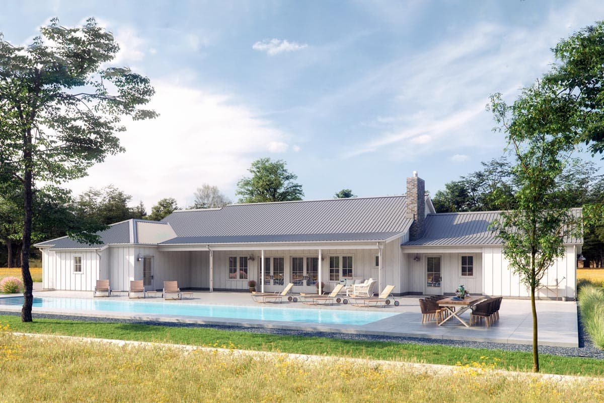 Modern Farmhouse house plan exterior, one story, with a covered porch, gabled roof, and stone chimney.