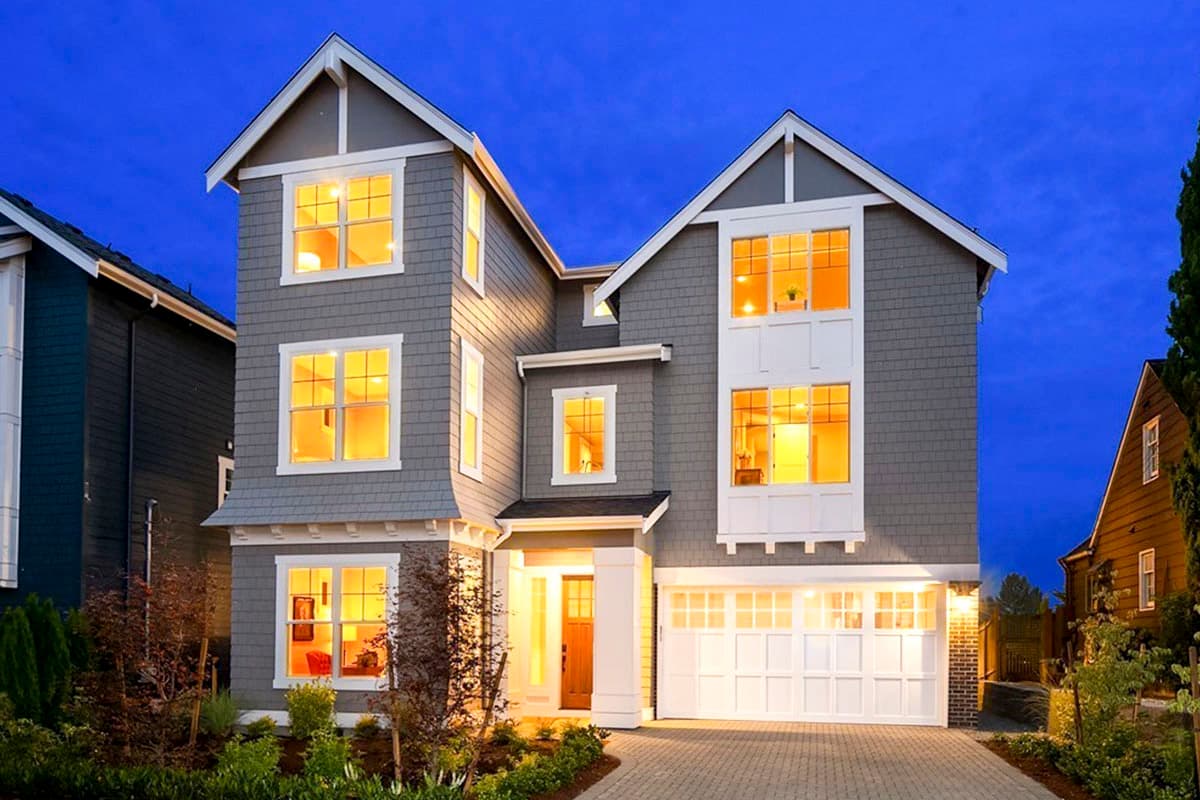 House plan exterior view, two-story Craftsman style home with gables, a covered entry porch, and a side-entry garage.