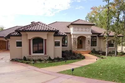 Tuscan-Inspired Home Plan with Finished Lower Level