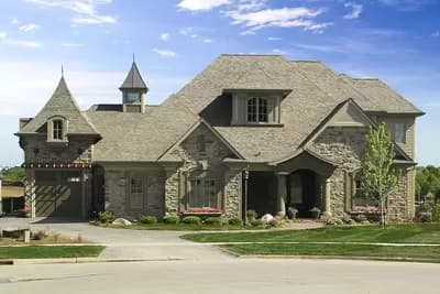 Chateau-style European Classic with Vaulted Ceiling above Great Room / Kitchen