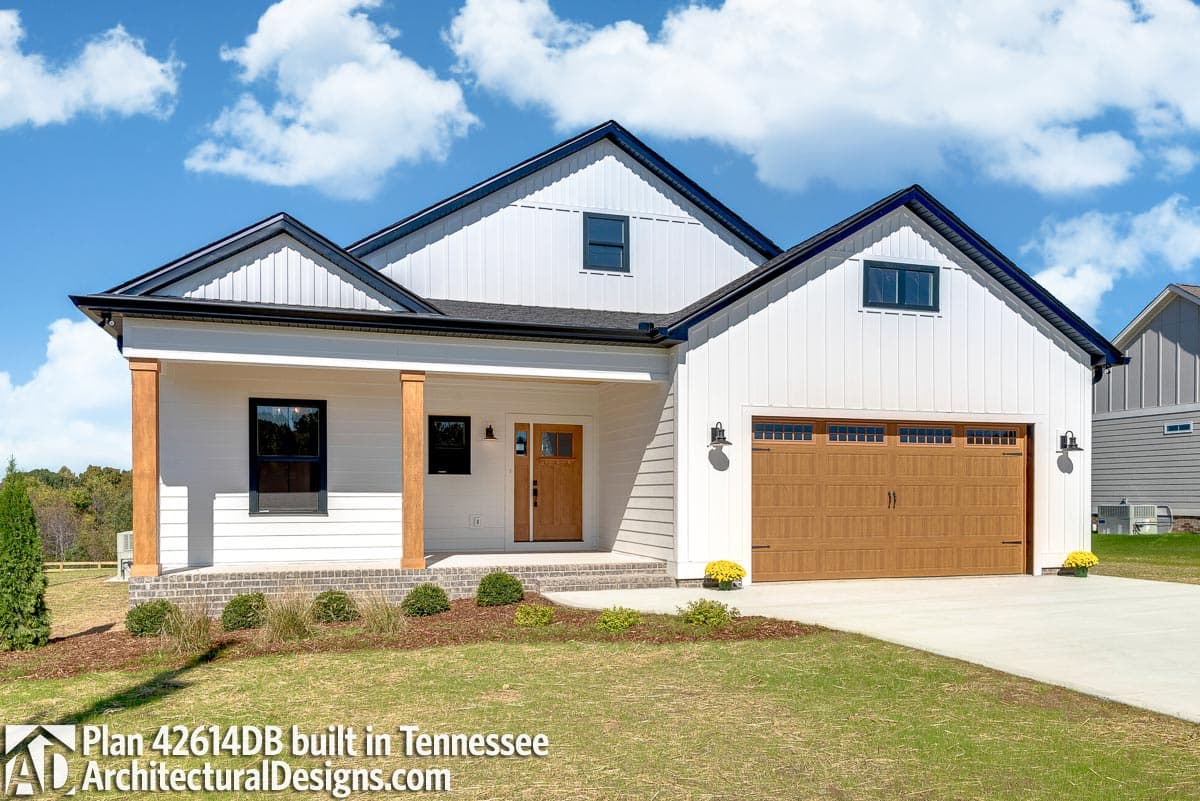Modern Farmhouse house plan exterior with board and batten siding, wood posts, gables, and a two-car garage.