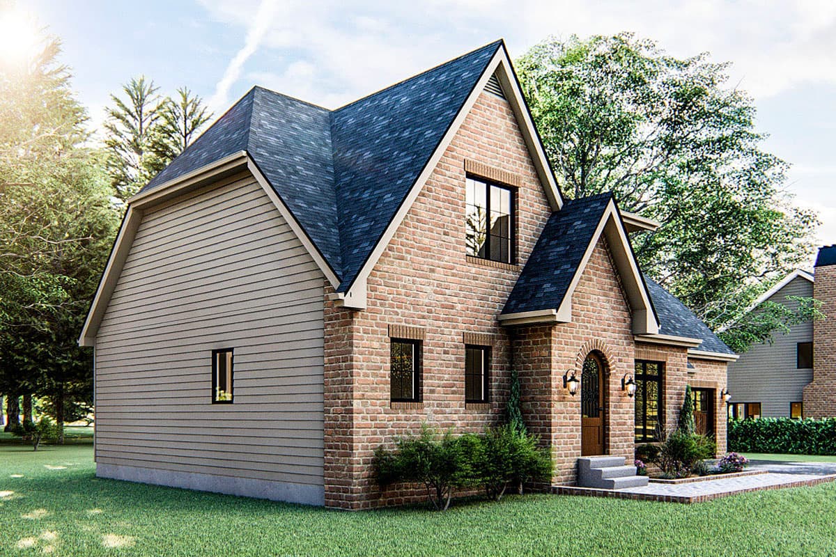 House plan exterior: Two-story brick and siding home with gables, arched entry, and multi-level rooflines.