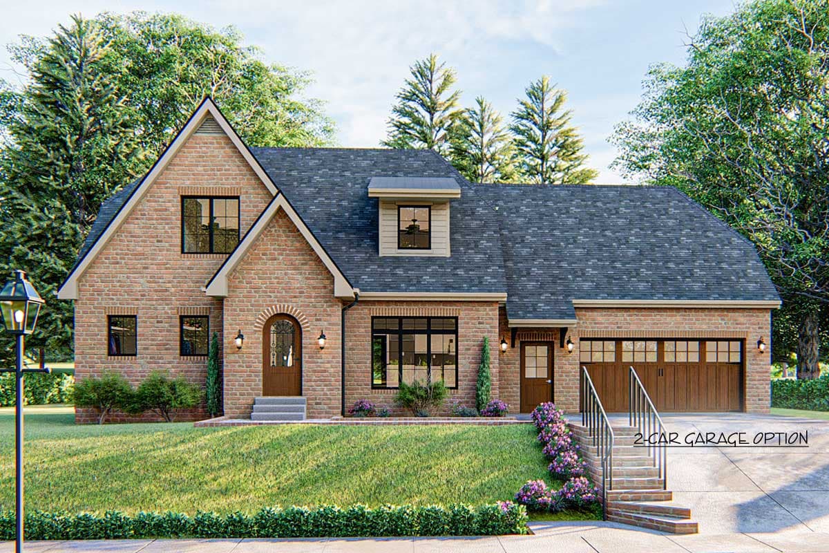 House plan exterior with brick facade, prominent gable, dormer, arched entry, and attached two-car garage.