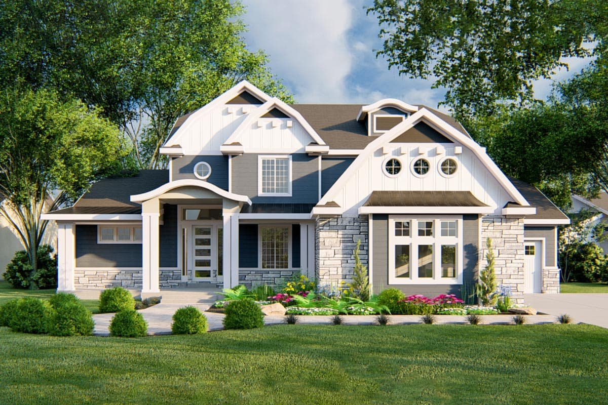 House plan exterior with two stories, multiple gables, stone accents, and a front porch with columns. Features circle and rectangular windows.