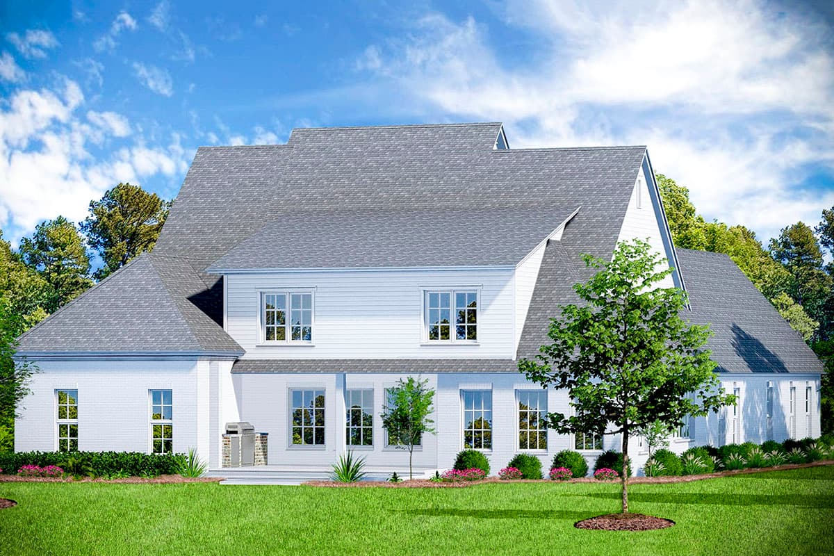 House plan exterior of a two-story home with a white siding and brick base, multiple gables, and a prominent roofline.