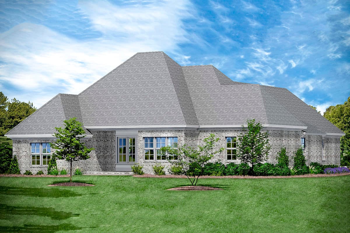 House plan exterior view of a single-story brick home with multiple gables and a hip roofline.