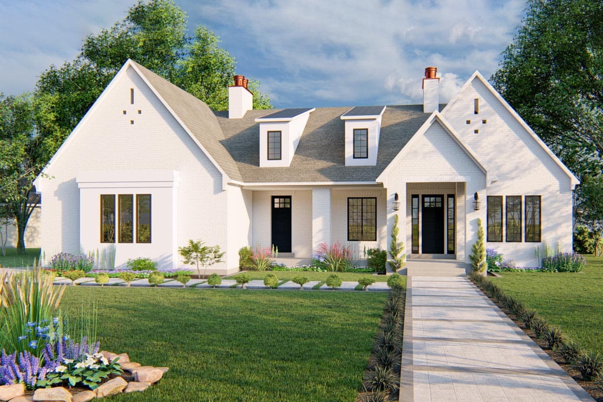 House plan exterior. Two-story home with gables, dormers, and a covered porch. Features brick facade and symmetrical window placement.