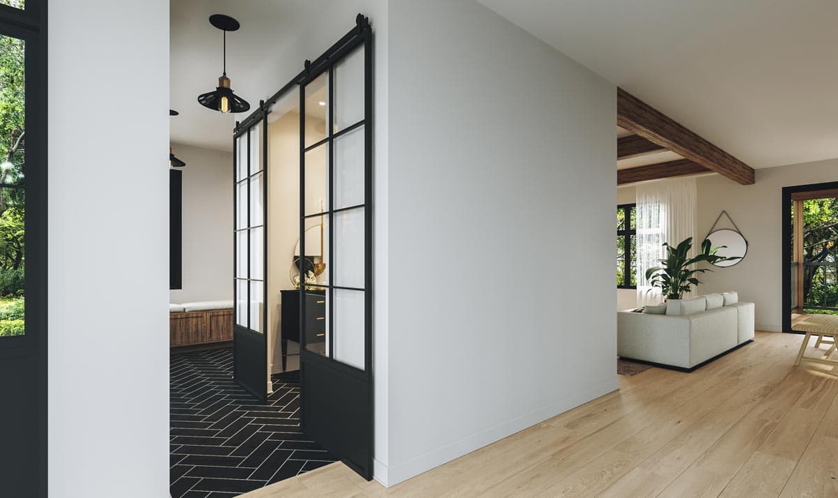 Interior view shows a hallway with sliding glass doors, herringbone tile, and a living area with exposed beams and a sectional sofa.