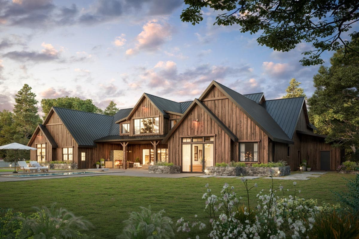 Modern farmhouse house plan exterior with wood siding, metal roof, gables, and covered porch with outdoor fireplace.