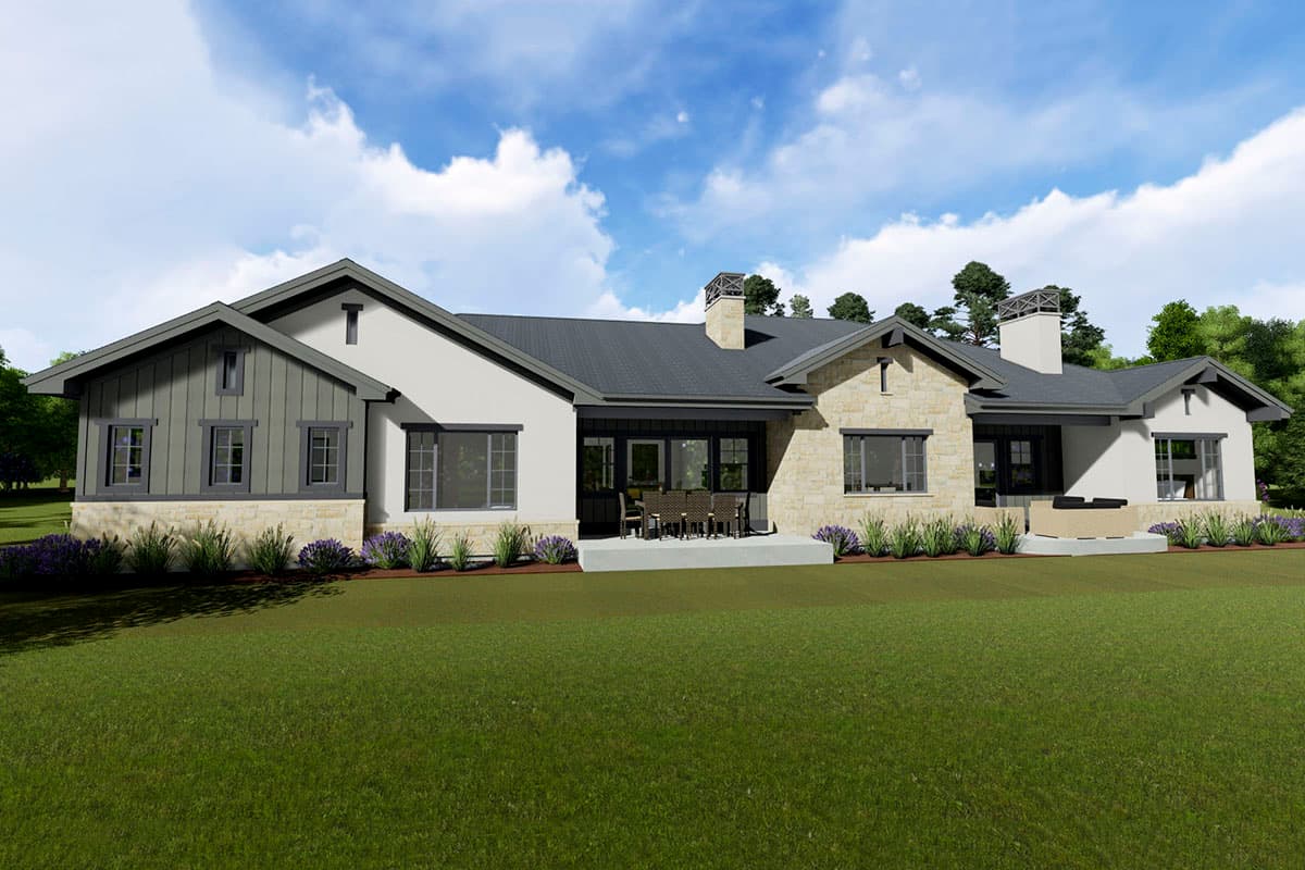 House plan exterior: Modern Farmhouse style, one story with stone and stucco facade, gabled rooflines, and prominent chimneys.