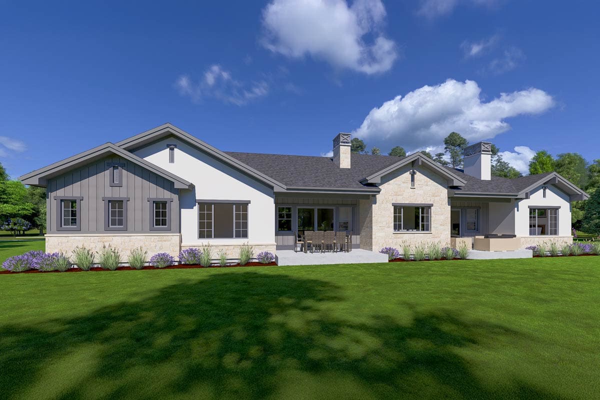 House plan exterior: Modern Farmhouse style, one story, with gables, stone and board-and-batten siding, and multiple chimneys.