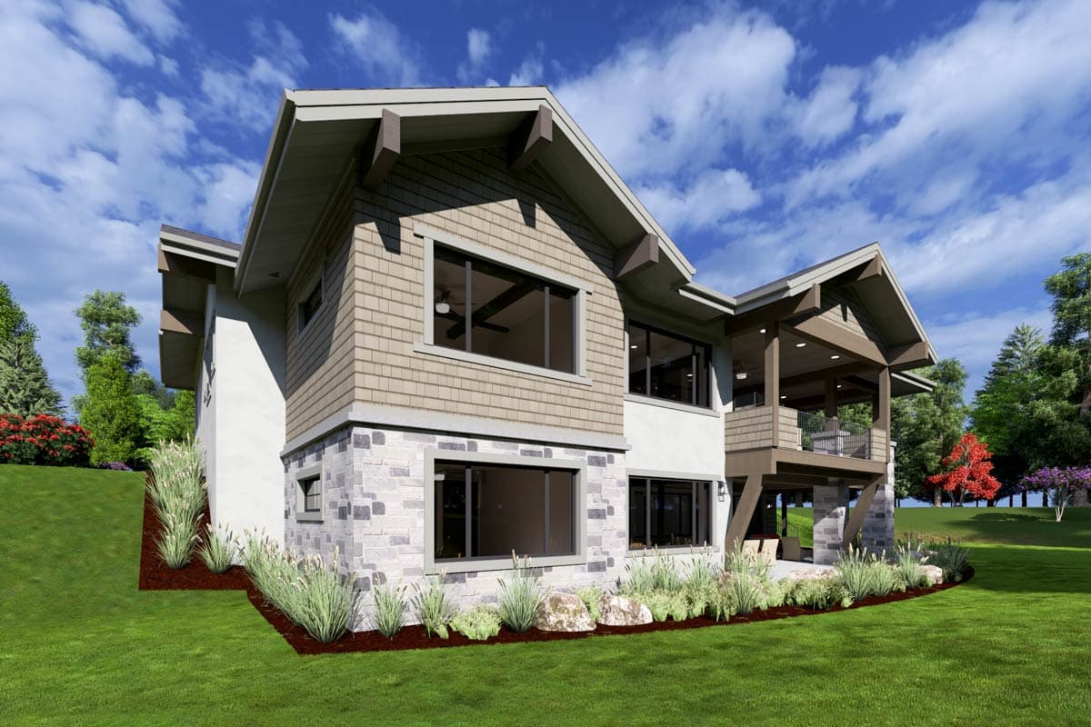 Modern house plan exterior with stone and shingle siding, multiple gables, exposed beams, and an upper-level balcony.