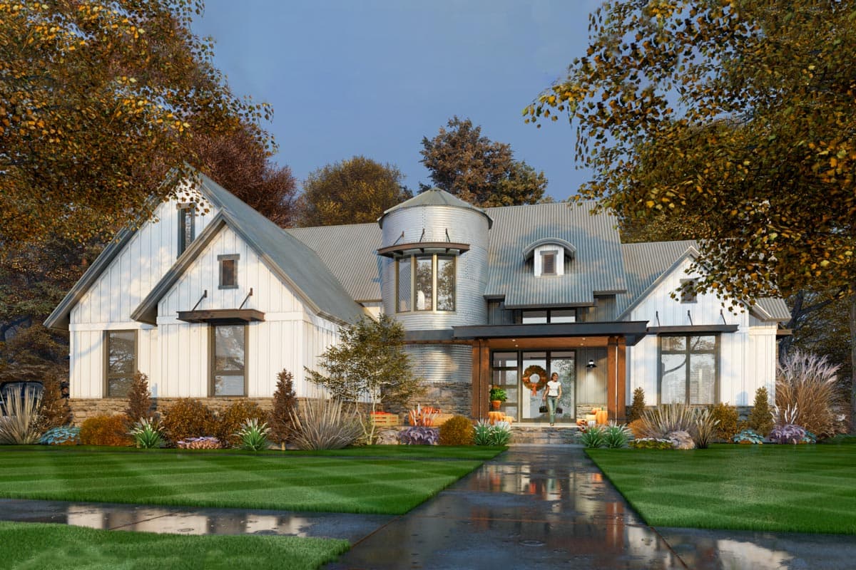 Modern Farmhouse house plan exterior with metal roof, silo-style turret, gables, and covered entryway.