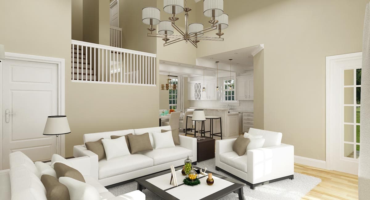 Interior rendering of a spacious great room and kitchen with vaulted ceilings, white sofas, island, and open staircase.