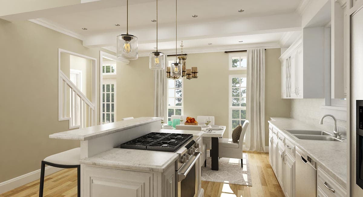 Kitchen and dining area with island, gas range, dual sink, white cabinets, and a dining table.
