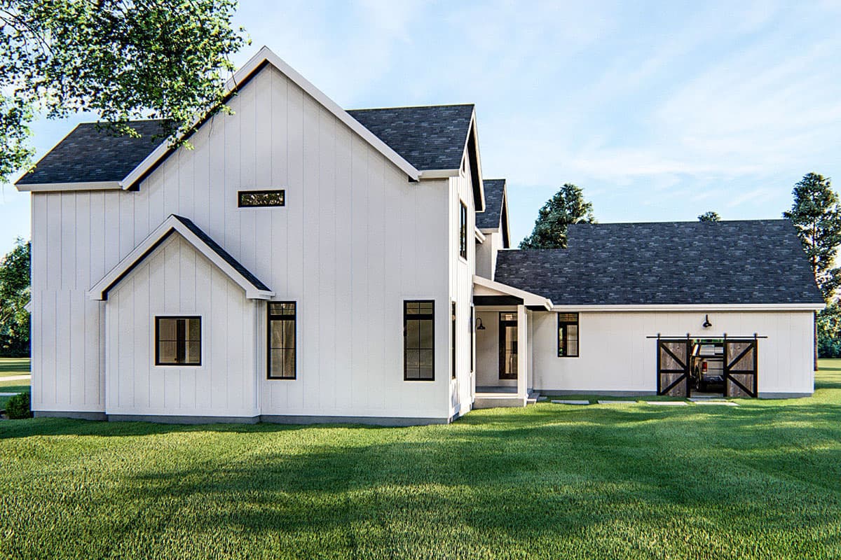 Modern Farmhouse house plan exterior with vertical siding, gable roofs, dormers, and a sliding barn door garage.