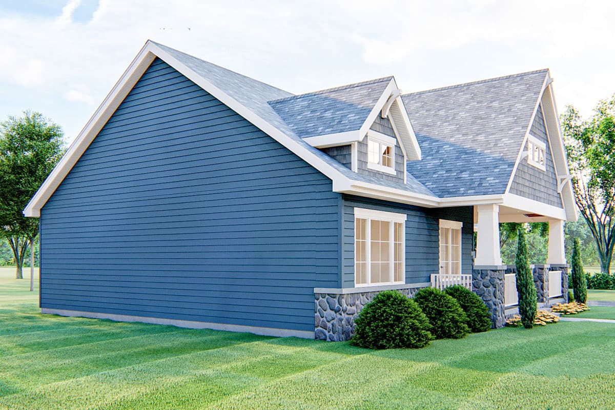 House plan exterior with blue siding, stone accents, gables, dormer, and covered front porch supported by stone pillars.