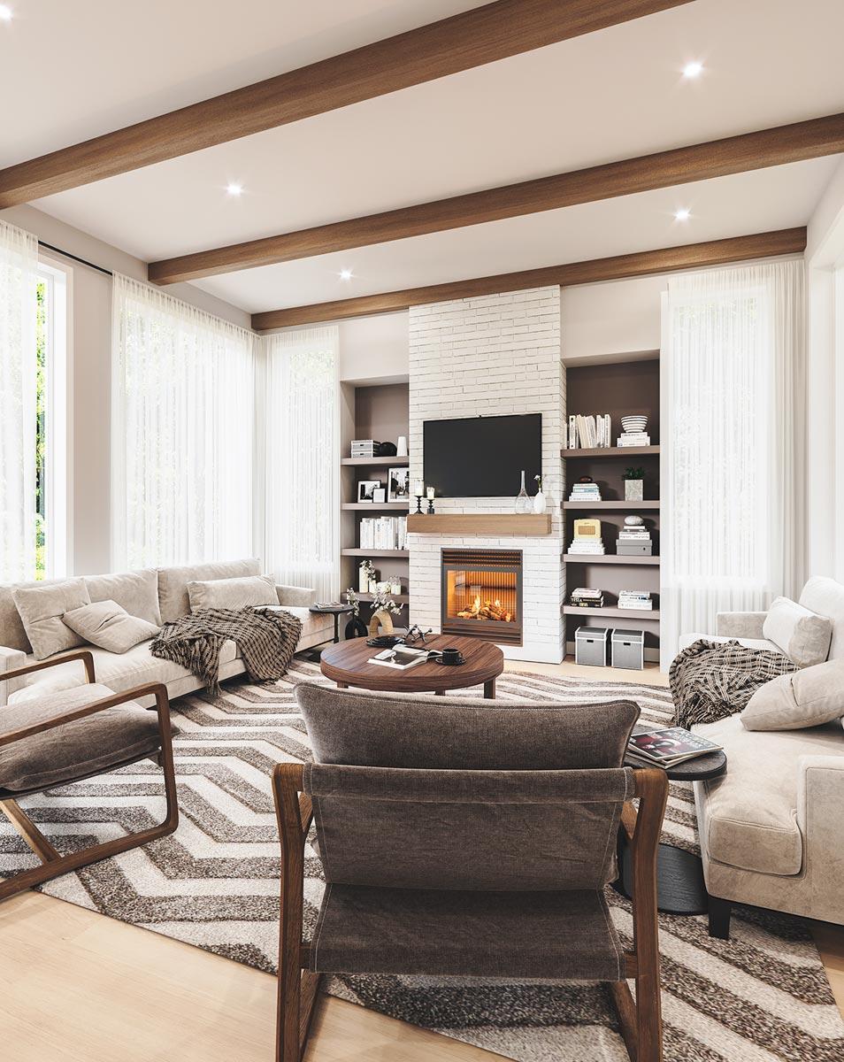 Great room with a fireplace, built-in shelves, beamed ceiling, and large windows.