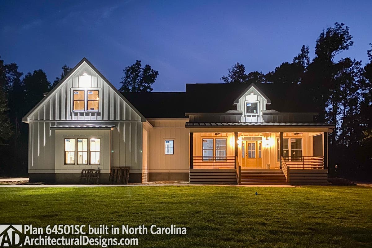 Modern Farmhouse house plan exterior with wide porch, board and batten siding, and gabled dormers.