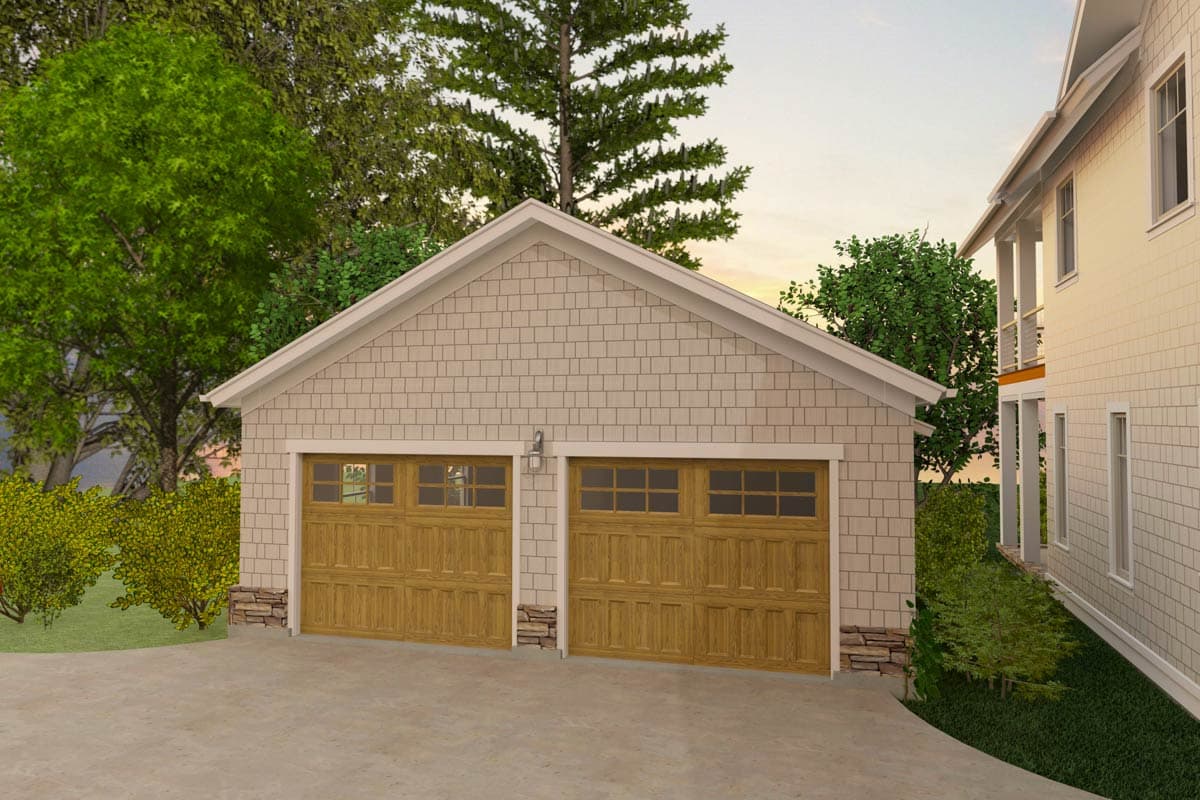 Two-car garage with shingle siding, wood doors with windows, and stone accents.