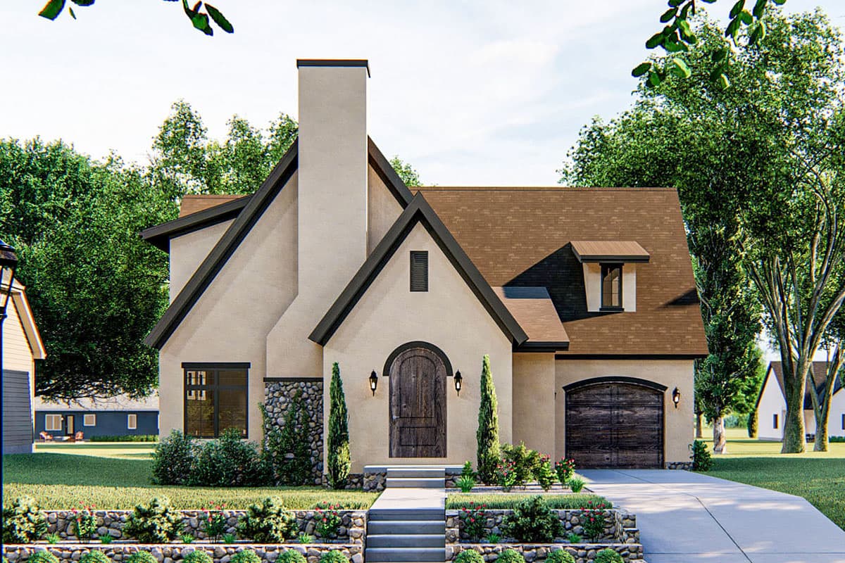 House plan exterior. Two-story Tudor style with prominent chimney, arched front door, and a multi-gabled roofline, and attached garage.