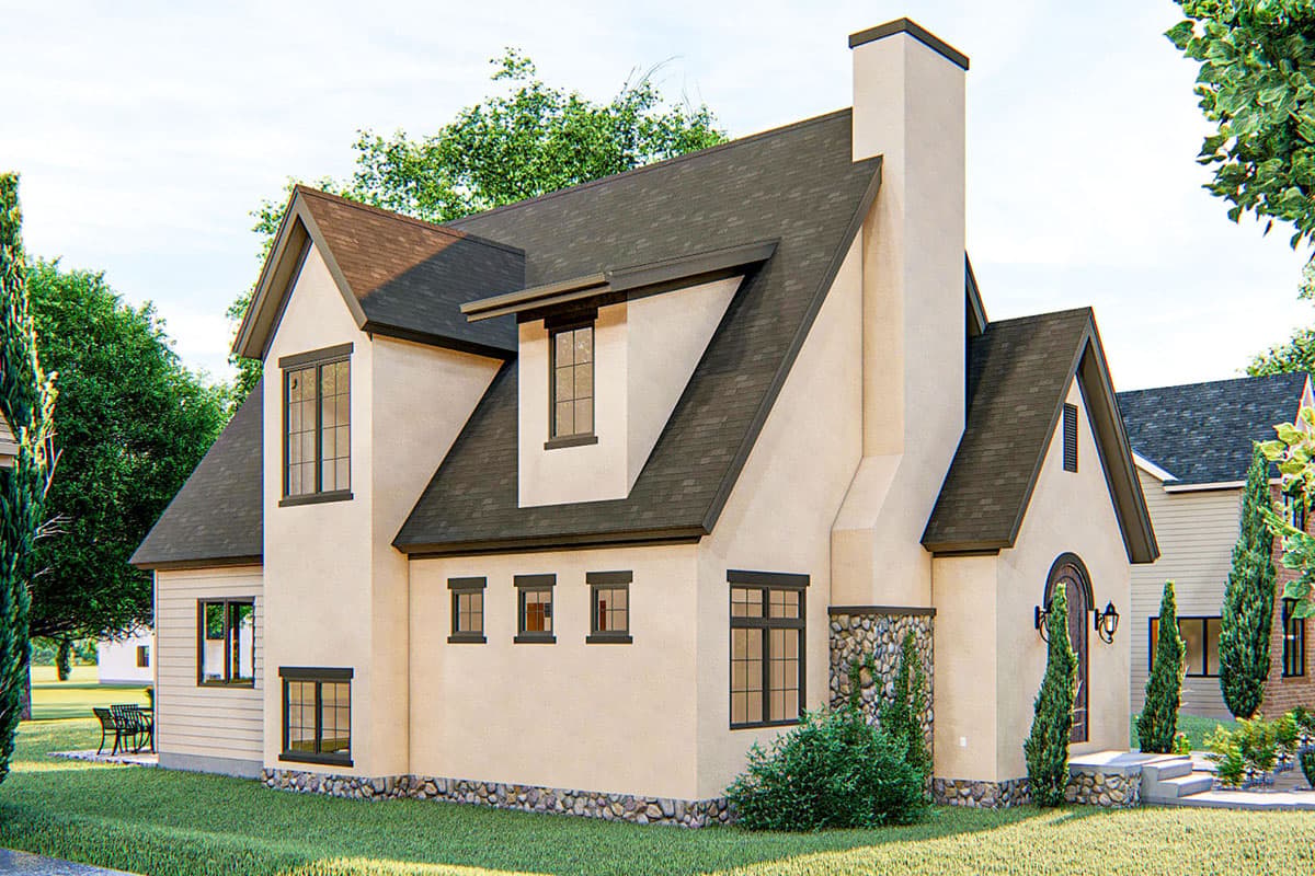 House plan exterior: Two-story stucco home with stone accents, prominent chimney, dormer, and arched entry.