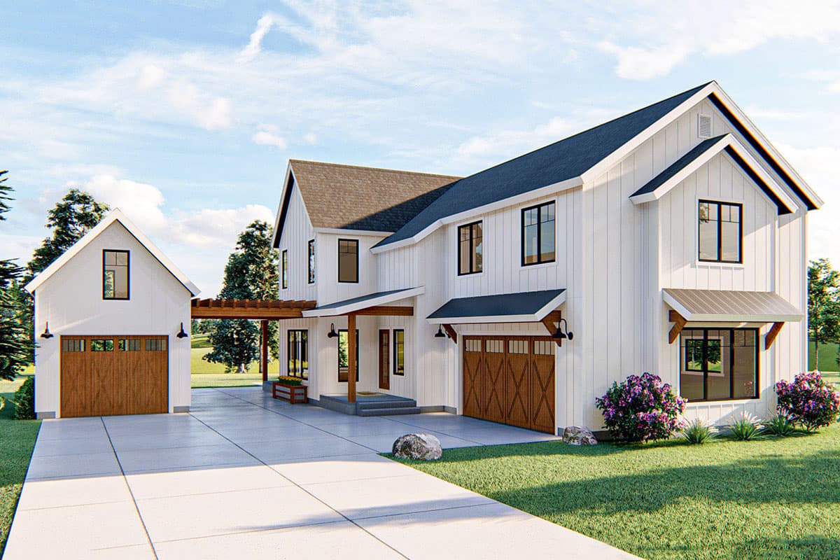 Modern Farmhouse house plan exterior with white siding, two attached garages, gables, and covered entry.