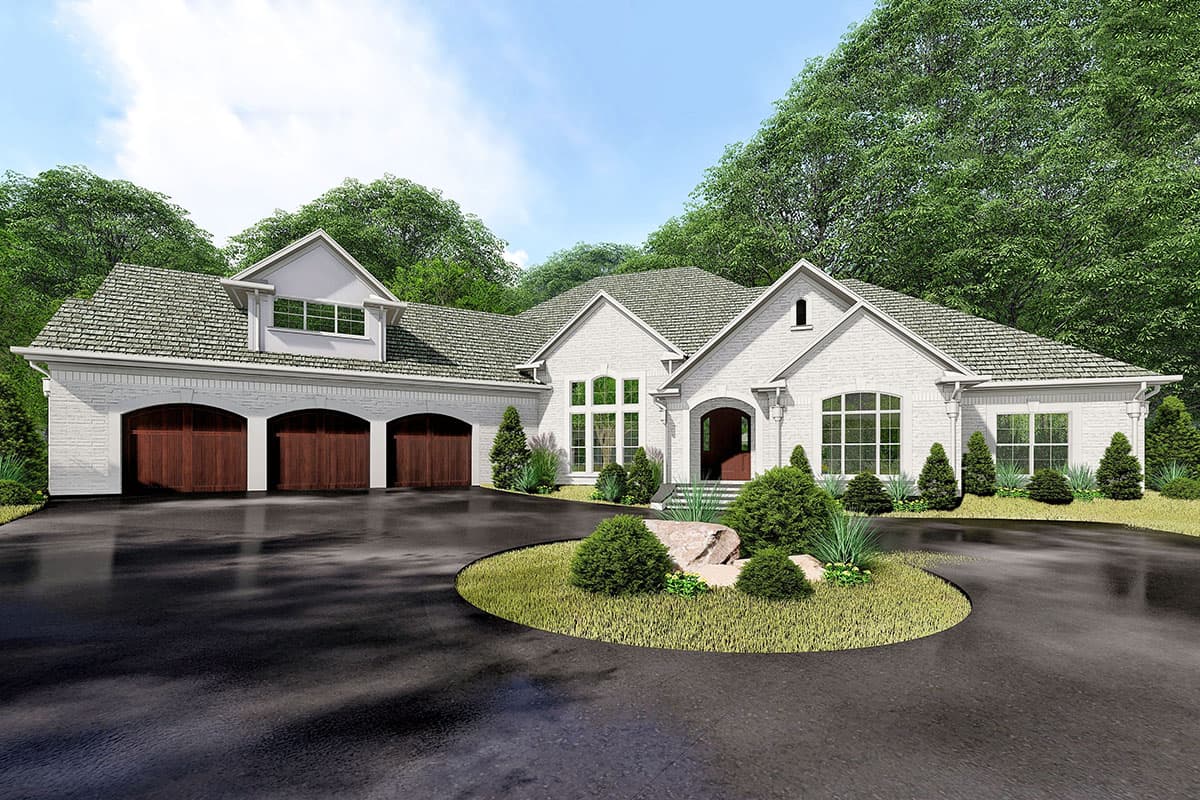 House plan exterior. One-story brick home with gabled roof, dormers, and three-car garage. Entry features arched door.