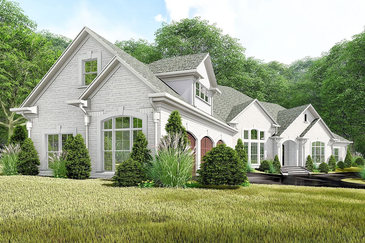 House plan exterior: White brick, two-story residence with gabled roofs, arched windows, dormer, and covered entry.