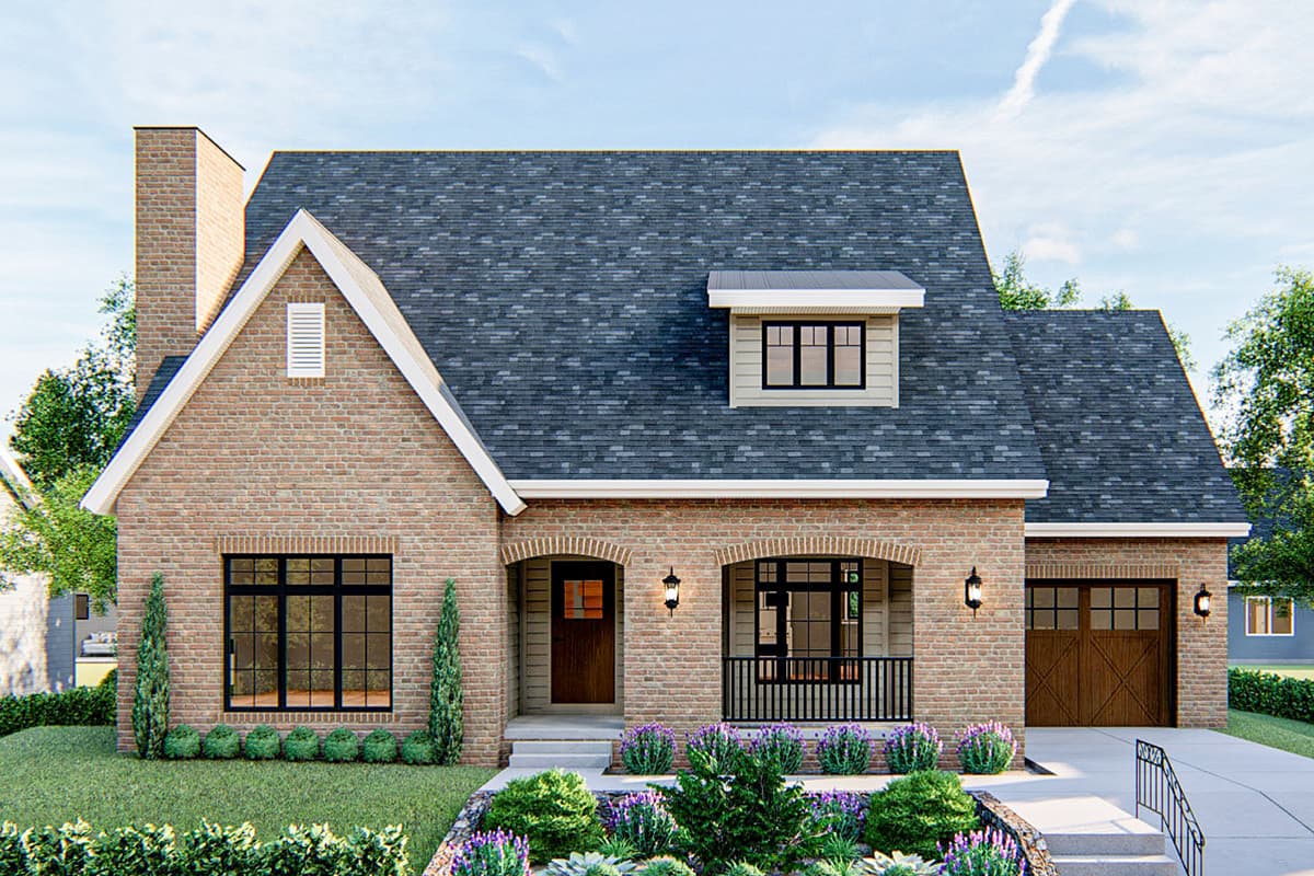 House plan exterior featuring a brick facade, gabled roof, and arched porch. Includes a two-car garage with cross design doors and dormer.