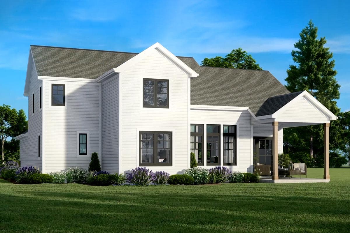 Two-story Modern Farmhouse exterior with white siding, gables, black-framed windows, and a covered porch with wooden posts.