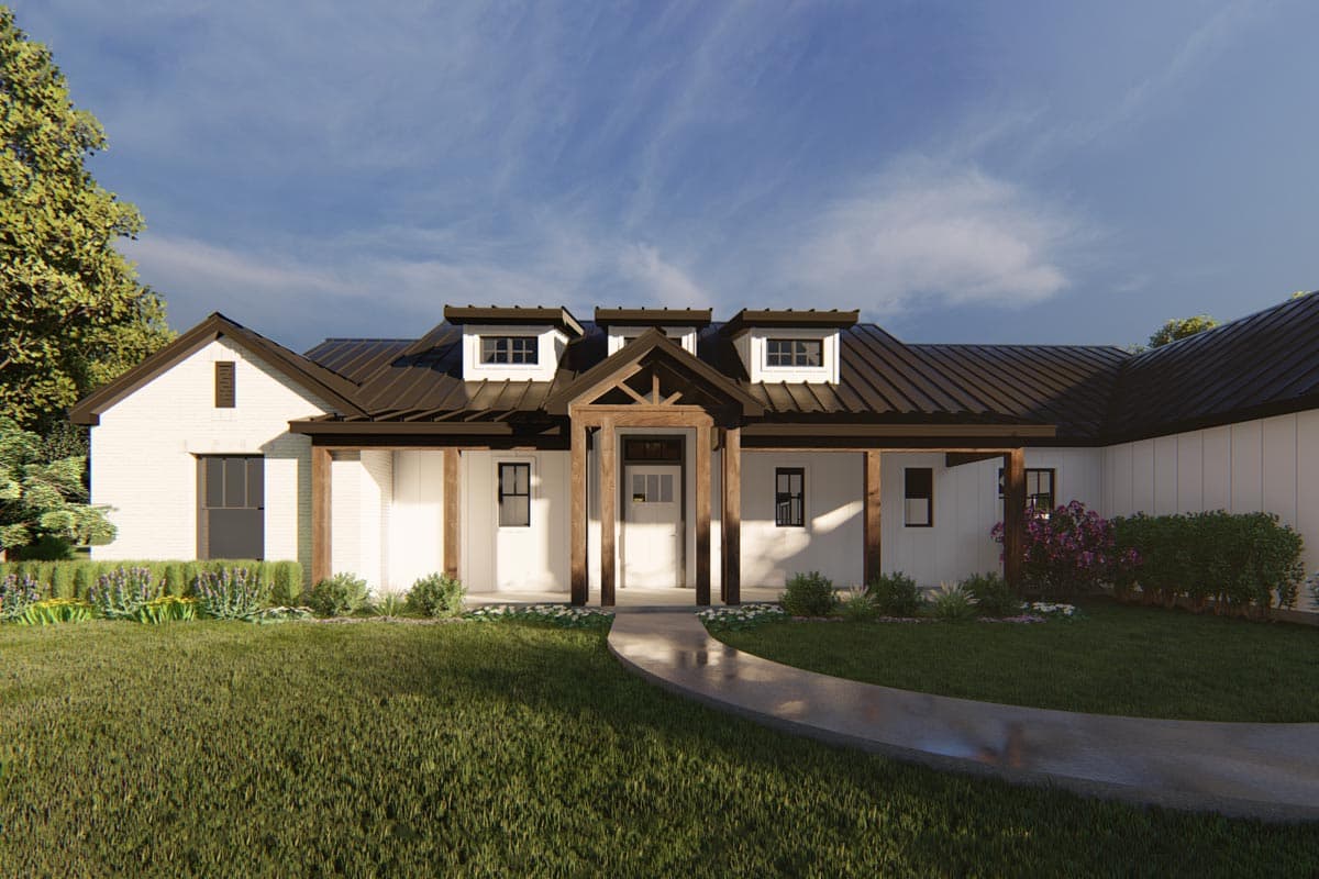 House plan exterior of a Modern Farmhouse with a prominent gable, metal roof, dormers, and timber-framed entryway.