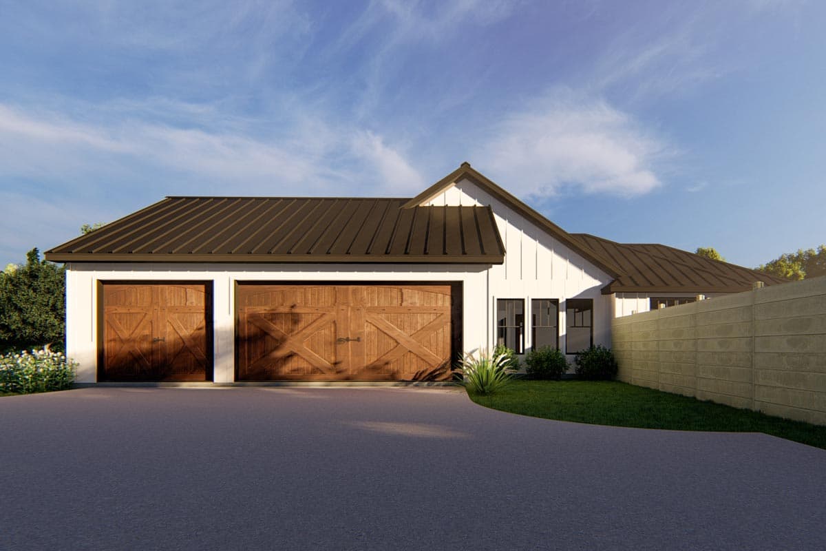 Modern Farmhouse house plan exterior with a white board-and-batten facade, dark metal roof, and double carriage-style garage doors.