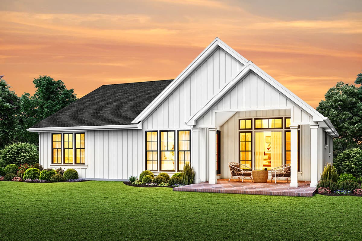 Modern Farmhouse house plan exterior with gables, prominent covered porch, and large windows.