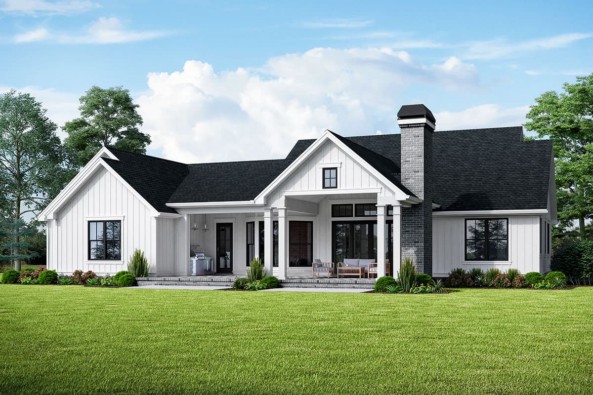 Modern Farmhouse house plan exterior with gables, covered porch, and brick chimney.