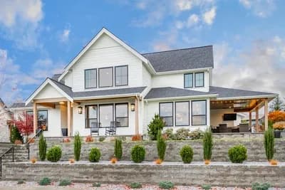 American Farmhouse Plan with Rear Courtyard Garage