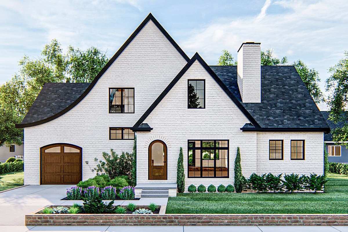 House plan exterior with two stories, a gabled roof, brick facade, and a garage. Features include arched door and black trim windows.