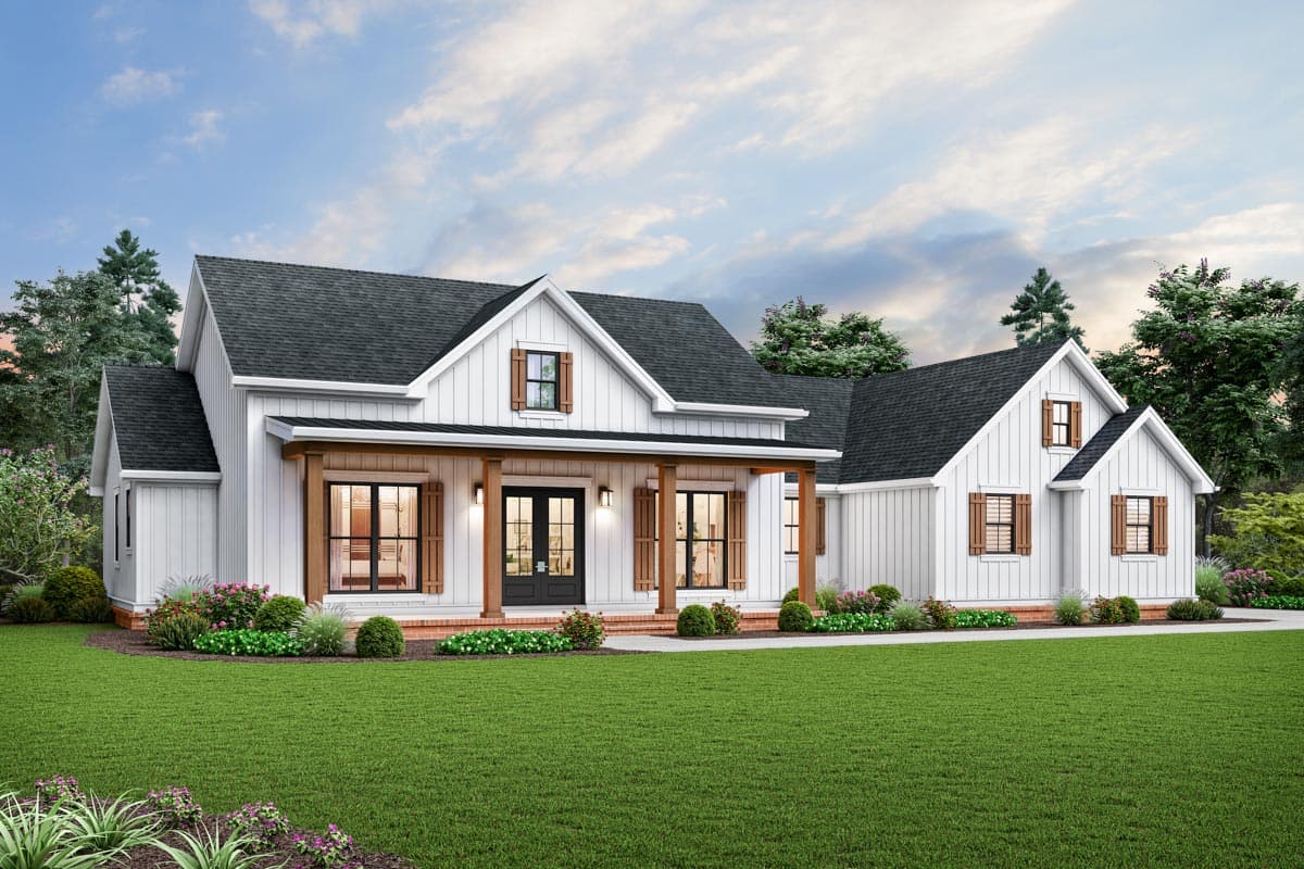 House plan exterior. Two-story Modern Farmhouse with a gabled roof, covered porch with columns, and decorative shutters on windows.