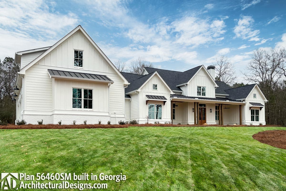 Modern Farmhouse house plan exterior with board-and-batten siding, multiple gables, and a wrap-around porch with wood beams.