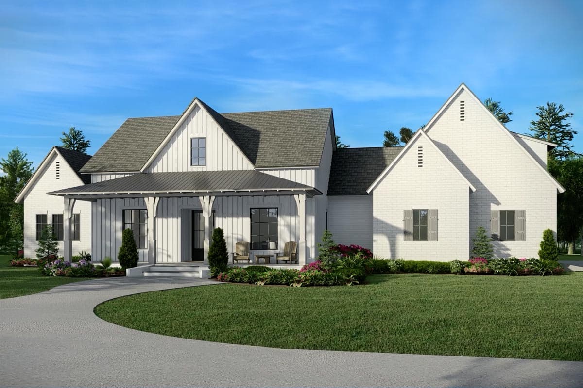 House plan exterior. Two-story Modern Farmhouse with a gabled roof, a covered porch, and a side-entry garage. Features a brick facade and dormers.