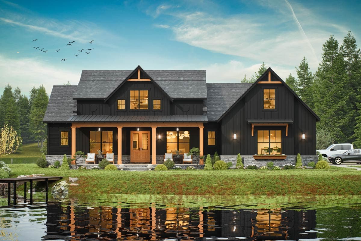 House plan exterior featuring a two-story Modern Farmhouse design with a covered porch, gabled roof, and dormers. Black siding with wood accents.