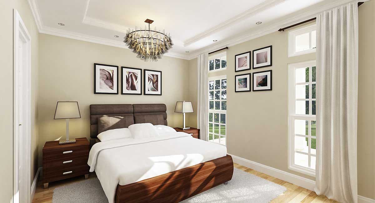Bedroom with tray ceiling, recessed lighting, modern chandelier, king bed, and large grid-pane windows.