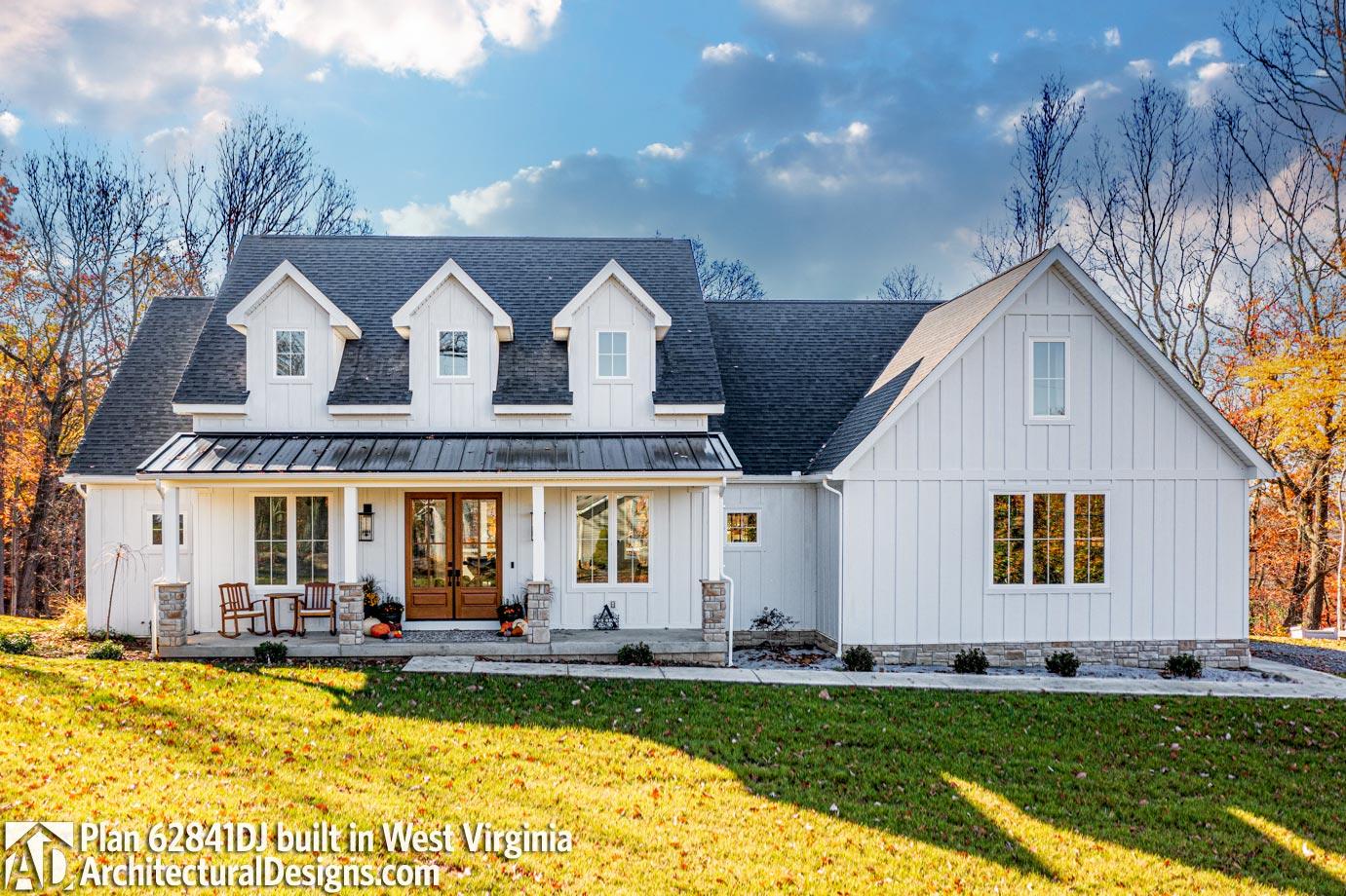 House plan exterior of a Modern Farmhouse style home with a covered porch, dormers, and board and batten siding.