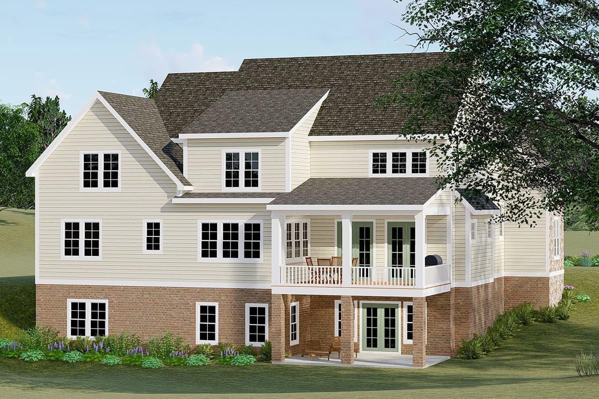 House plan exterior: Three-story home with vinyl siding, brick foundation, multiple gables, and a second-story covered porch.