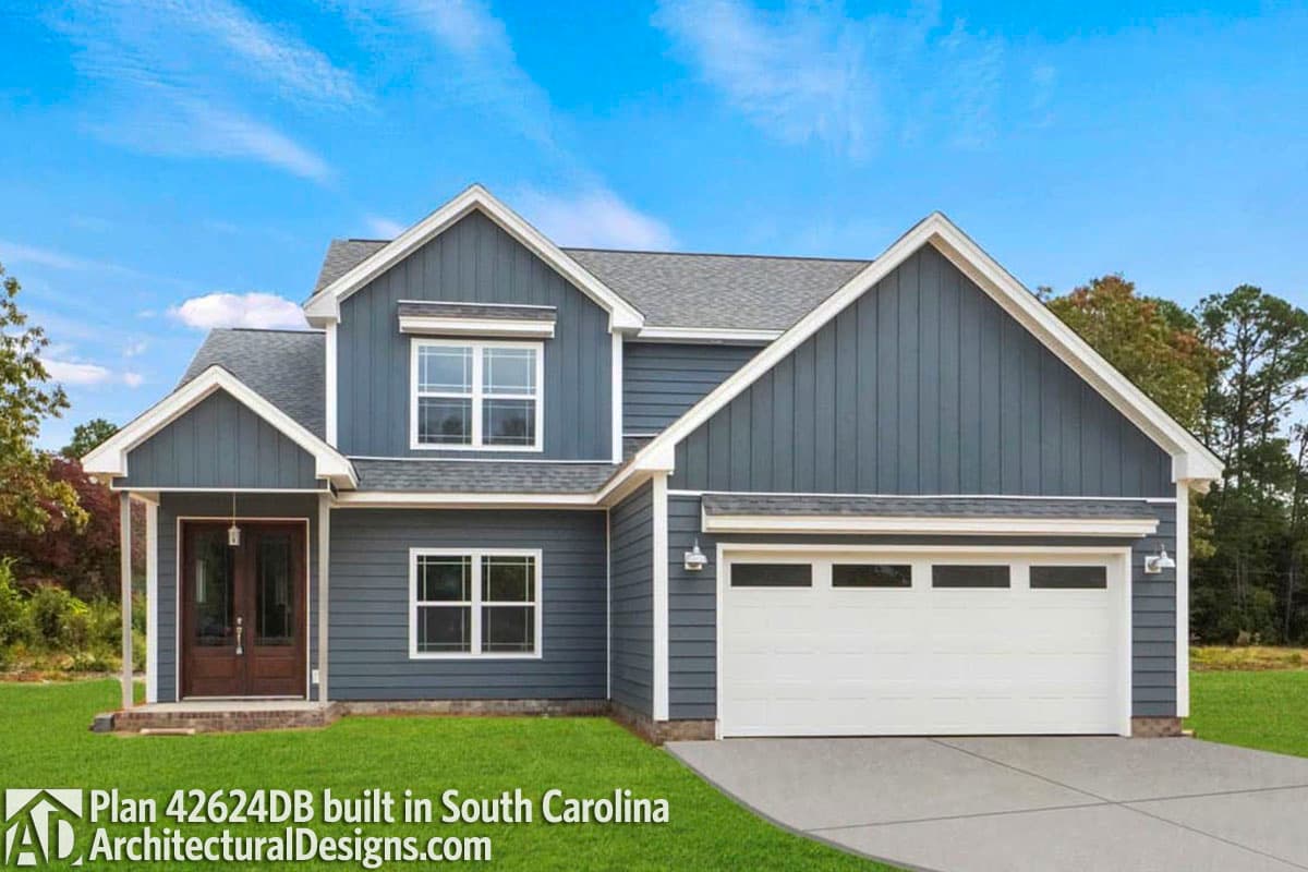 House plan exterior. Two-story home with Craftsman style. Features include a front-facing gable, covered entry porch, and attached garage.