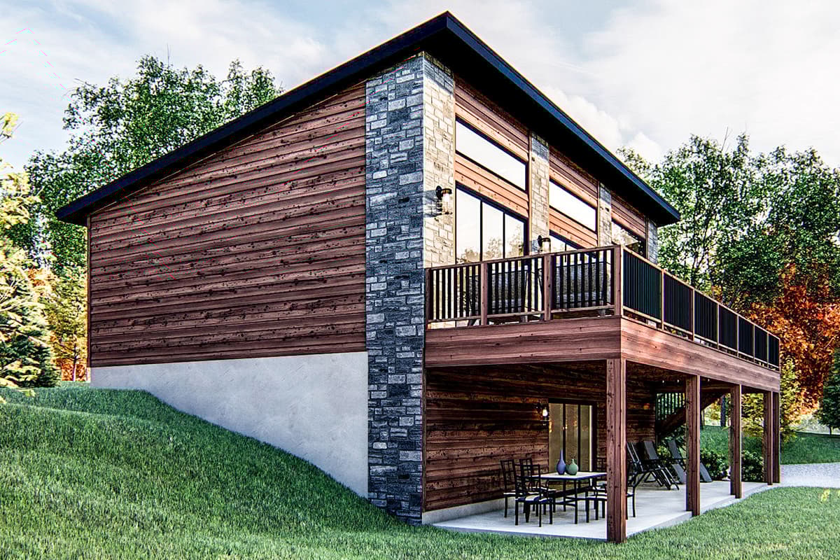 House plan exterior featuring wood siding, stone accents, large upper windows, and a deck over a walk-out lower level.
