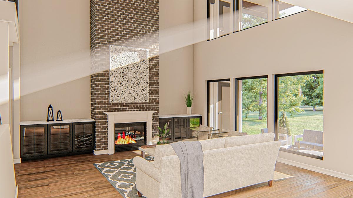 Interior rendering of a great room with a vaulted ceiling, brick fireplace, and large windows overlooking a yard.